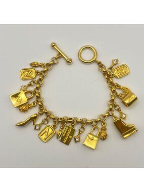 Nordstrom Gold Tone Charm Bracelet 6.75" 49g Purse Shoe Piano Cup Toggle Signed